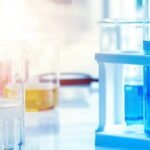 Laboratory glassware with liquid solutions
