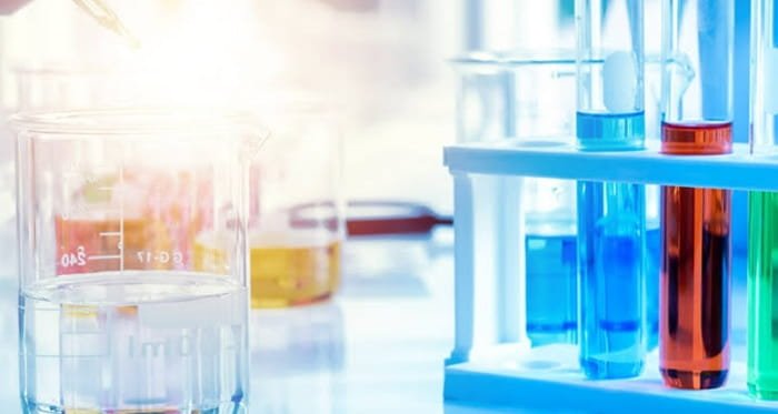 Laboratory glassware with liquid solutions